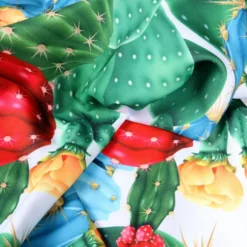 Tovaglia antimacchia rotonda Hydro Cactus Disegno 3 Cactus su fondo azzurro con fiori gialli e rossi 160